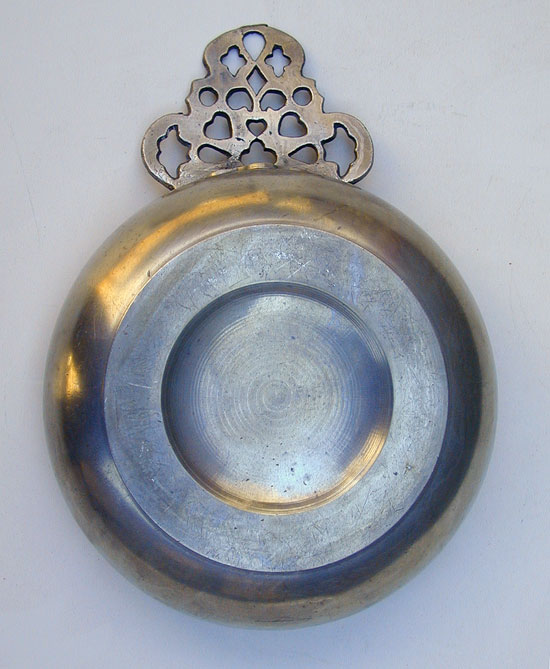 An Unmarked Export Pewter Porringer with Geometric Handle