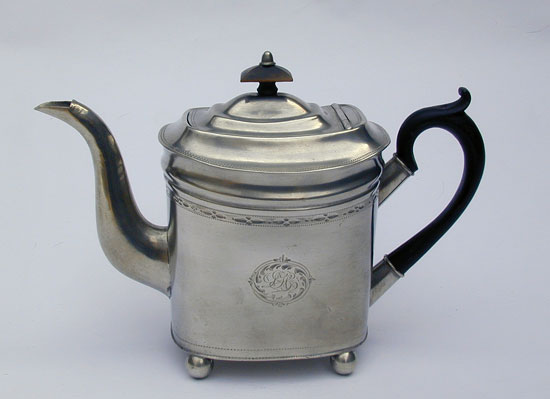 An Unmarked Ball Foot Bright Cut Engraved Teapot