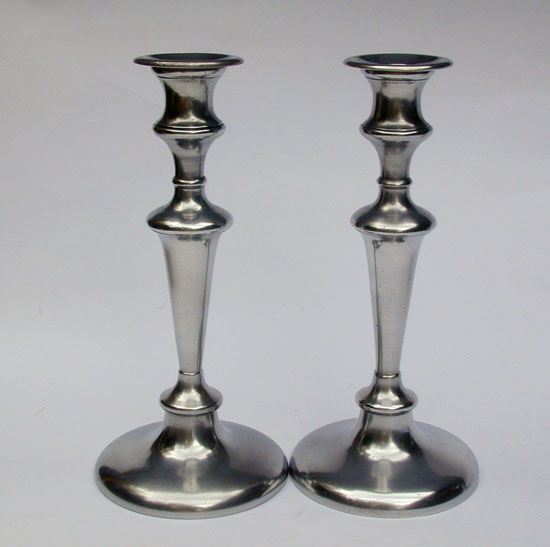 A Pair of Thomas Wildes Tall Pewter Candlesticks