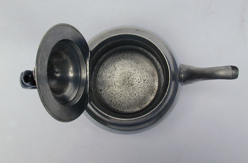 A Pewter Inverted Mold Pewter Teapot by J.B. Woodbury