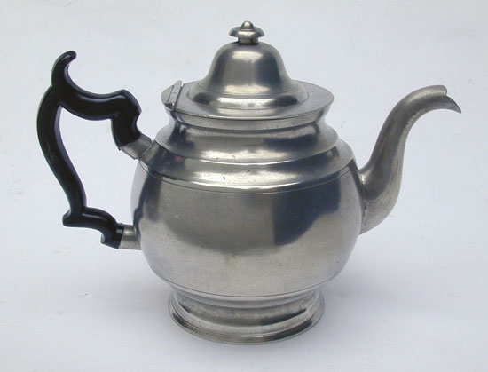 A Pewter Inverted Mold Pewter Teapot by J.B. Woodbury