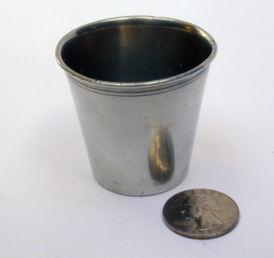 A Small Pewter Marked Beaker