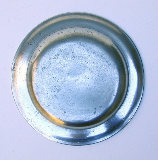 An Unmarked American Pewter Butter Plate