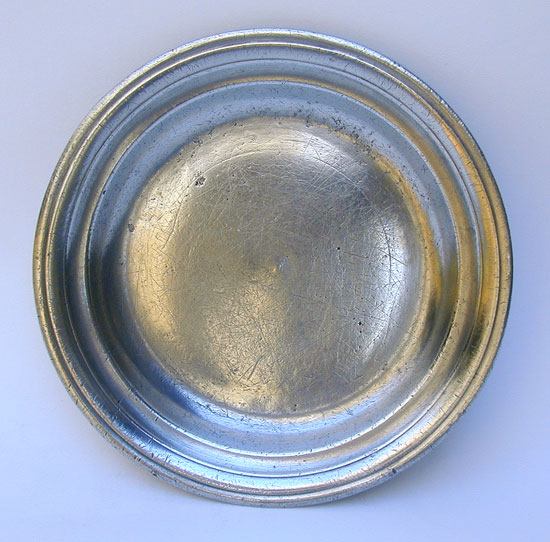 A Small Size Unmarked American Pewter Butter Plate