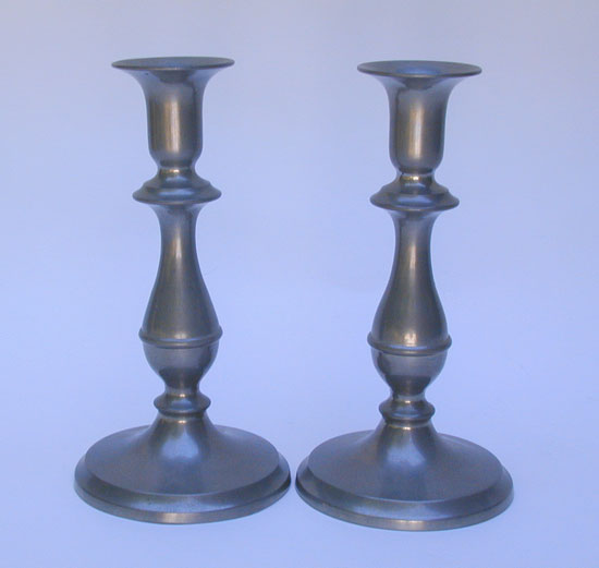 A Pair of 20th Century Flagg & Homan Candlesticks