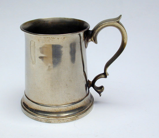 A Brass English Mug with Double 