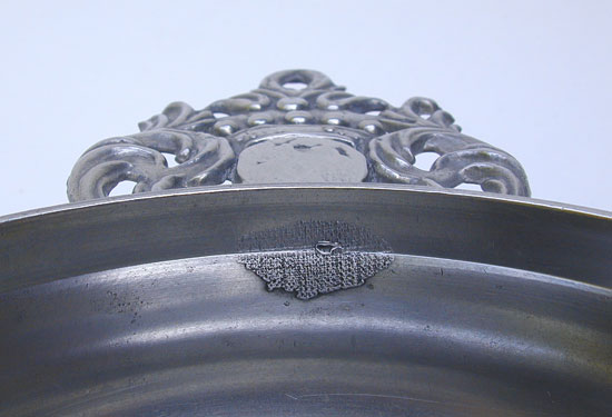 A Scarce Unmarked American Pewter Spline Handle Porringer from the Belcher/Danforth Molds