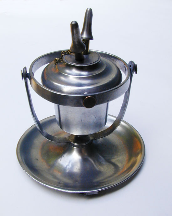 An Antique Pewter True Gimbal Lamp