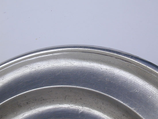 A Single Reed Rim Pewter Plate by Ashbil Griswold