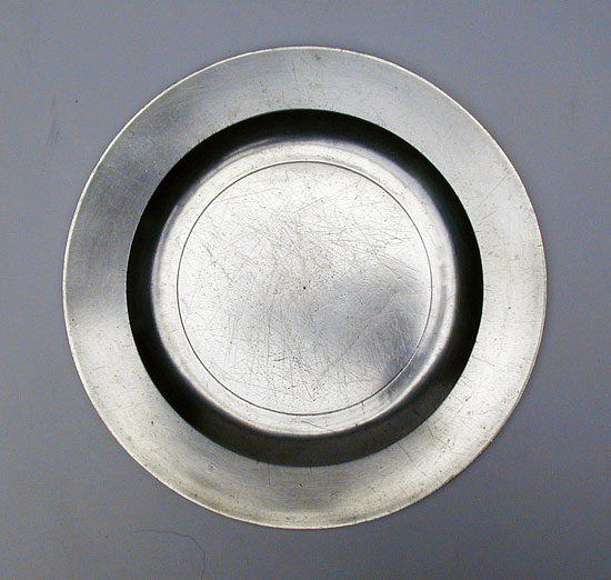 A Flat Rim Export Pewter Plate by Robert Bush & Co