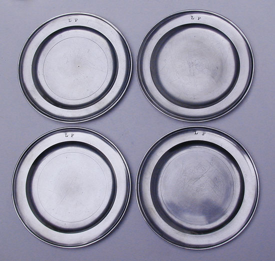 An Outstanding Set of 4 Thomas Badger Pewter Plates