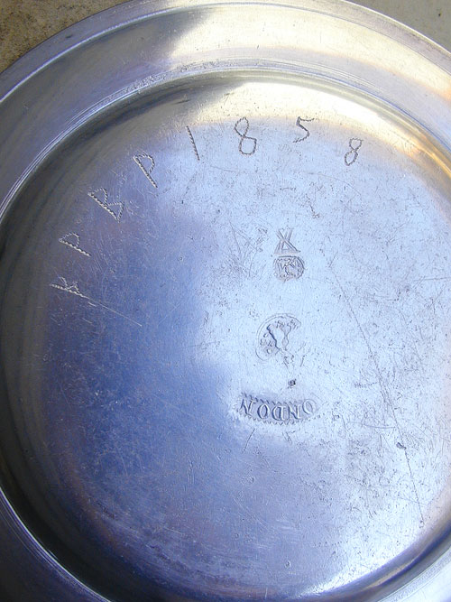 A Near Mint Pewter Plate by Love
