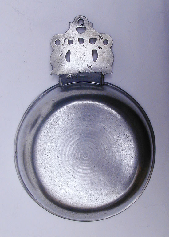 A Scarce Unmarked American Dolphin Handled Pewter Porringer