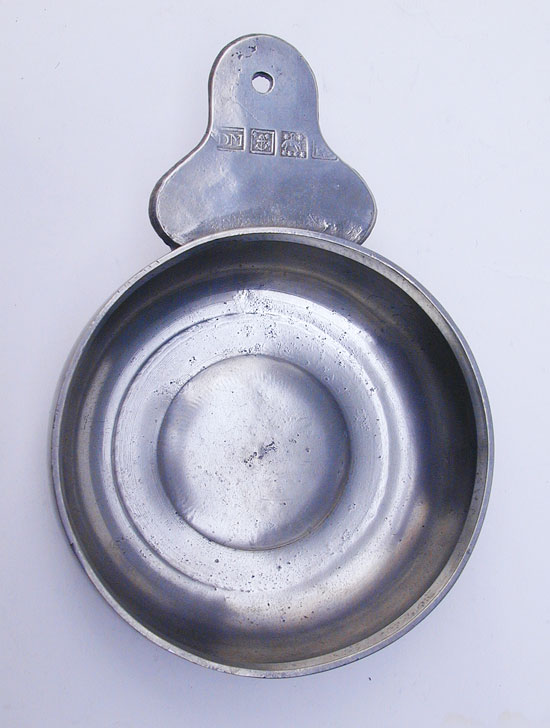 A Scarce Rhode Island Tab Handle Porringer by David Melville.