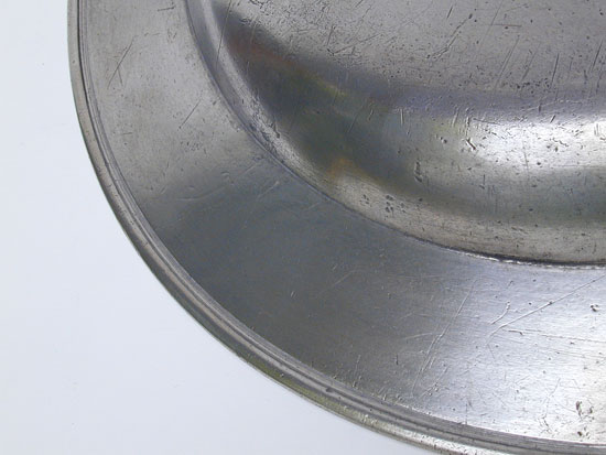 A Scarce Flat-Rim Plate by Cornelius Bradford