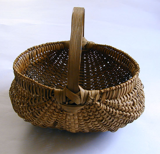 A Late 19th early 20th Century Buttocks Basket