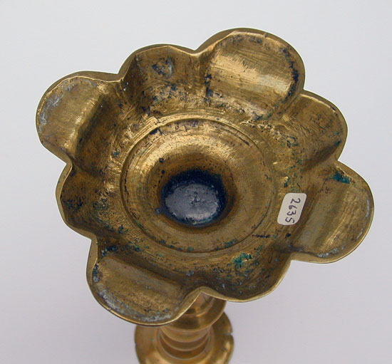 A Queen Anne Petal Base Brass Candlestick
