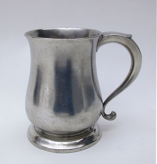 An Unmarked English Pewter Export Quart  Tulip Mug